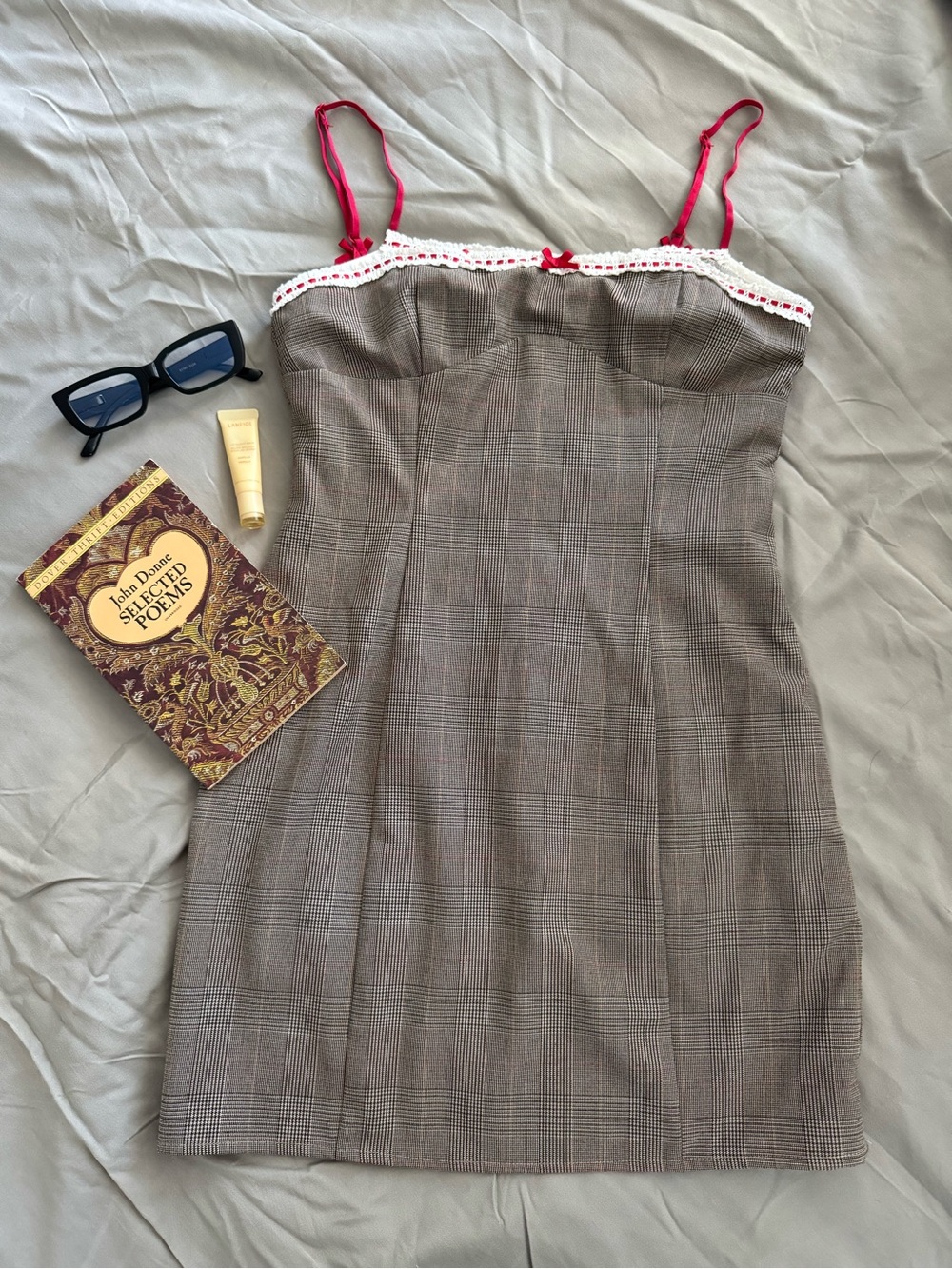 Plaid lined Dress with red and lace Trim with bow strap accents